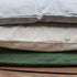 Long cushions with removable covers made of robust cotton house canvas